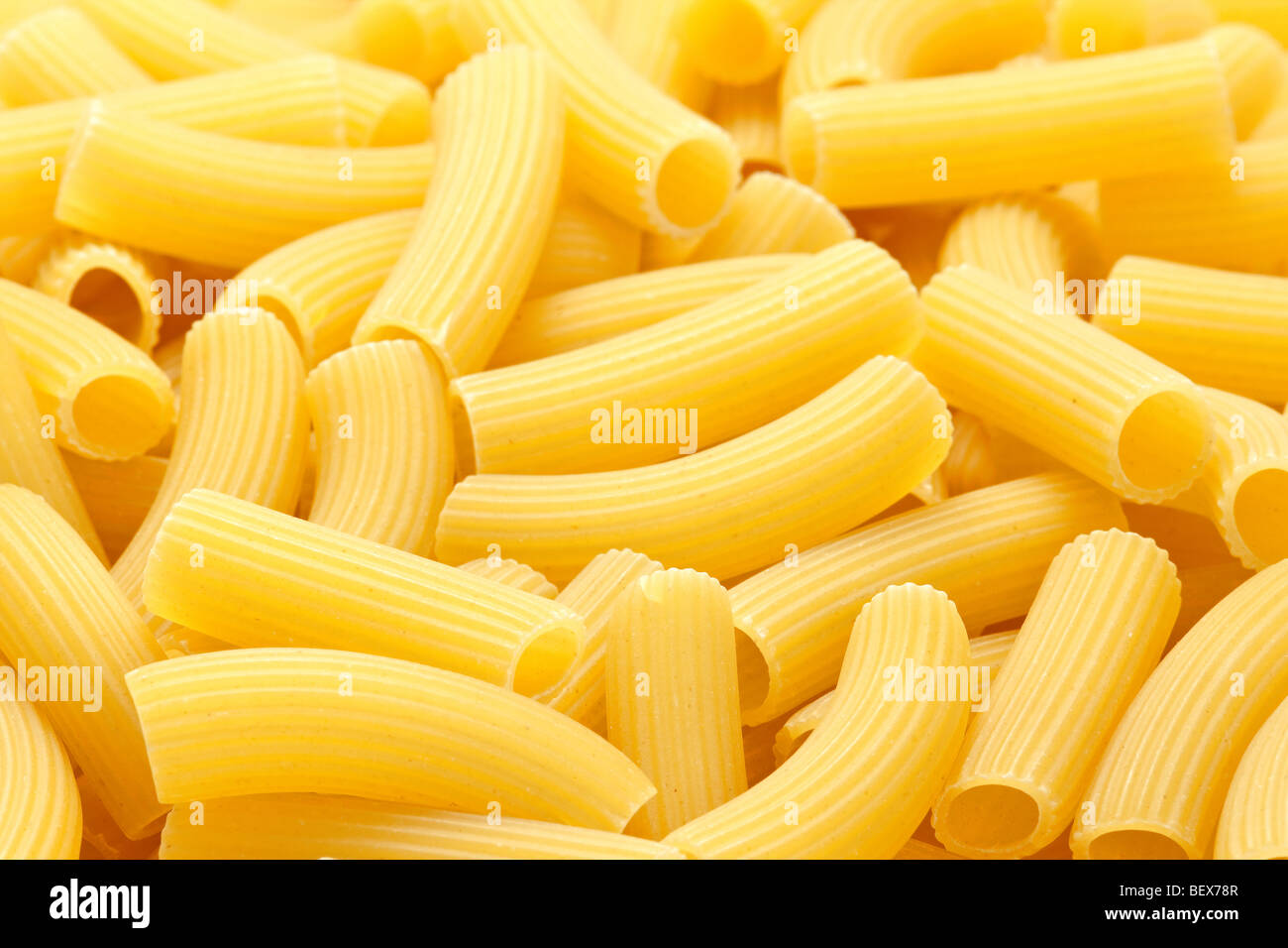 Rigatoni pasta background Stock Photo