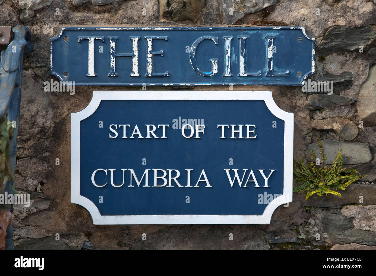 Plaque marking the start of The Cumbria Way long distance path in The Gill square in Ulverston Stock Photo
