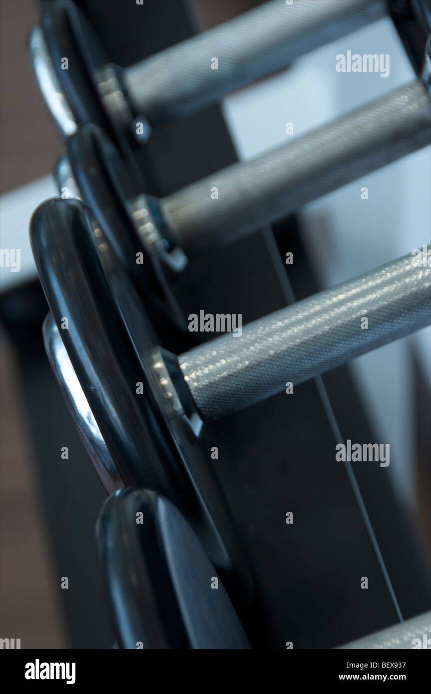 Barbell weights in a gymnasium or fitness club. Stock Photo