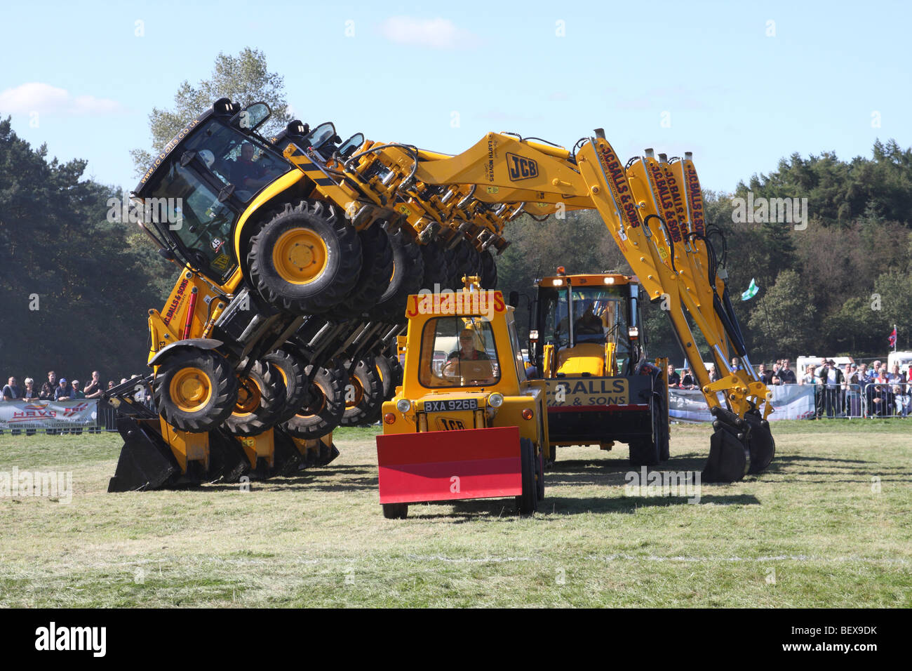 J C Balls, JCB Display Team at the Cromford Steam Rally, Derbyshire, England, U.K. Stock Photo