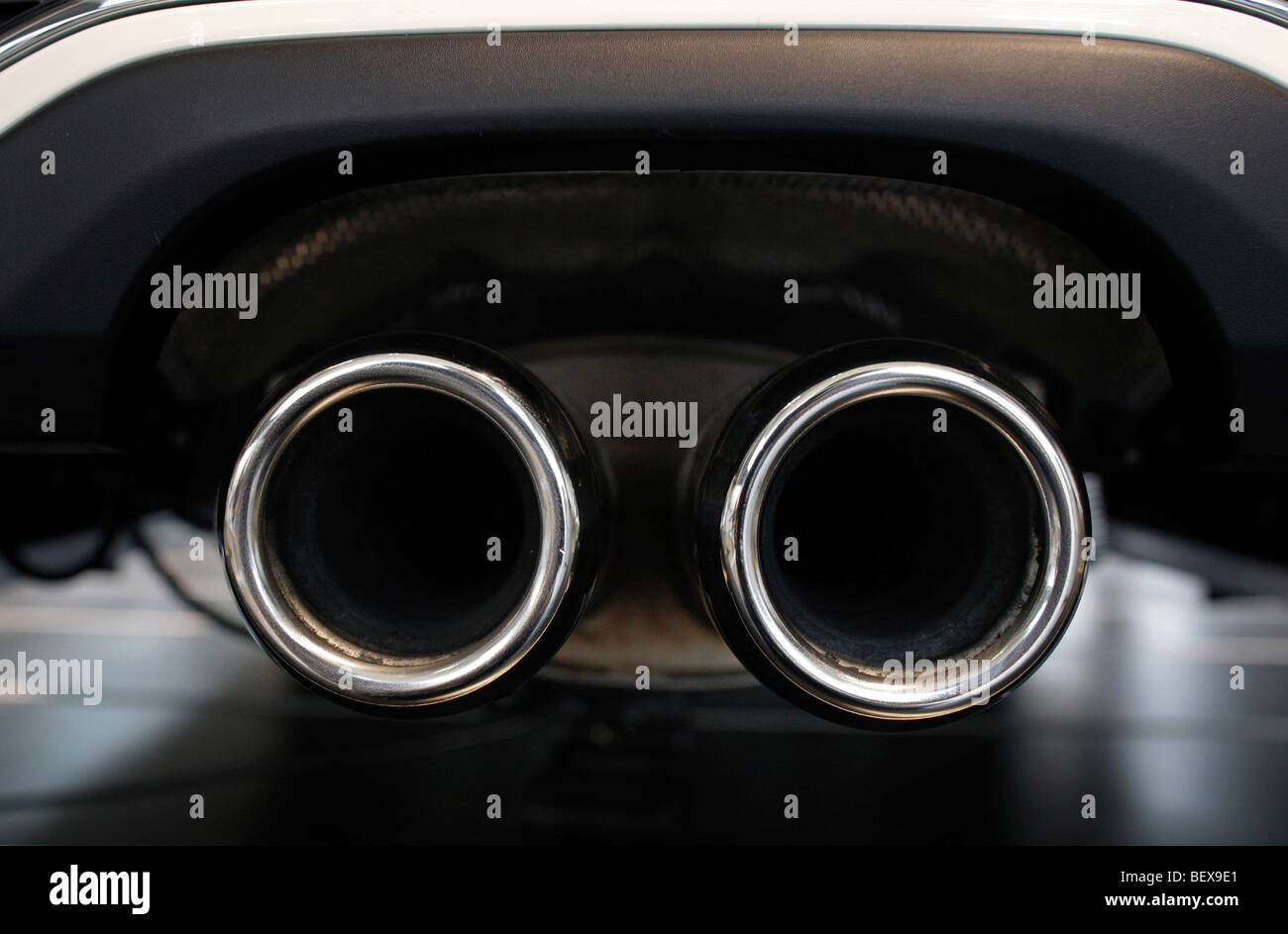Exhaust pipe of a Mini Cooper S Stock Photo