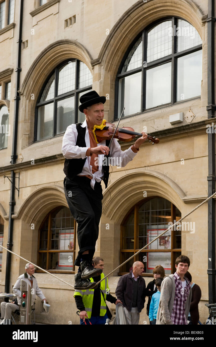 Tight Rope Playing Instruments Tightrope walker playing violin hi-res stock photography and images - Alamy