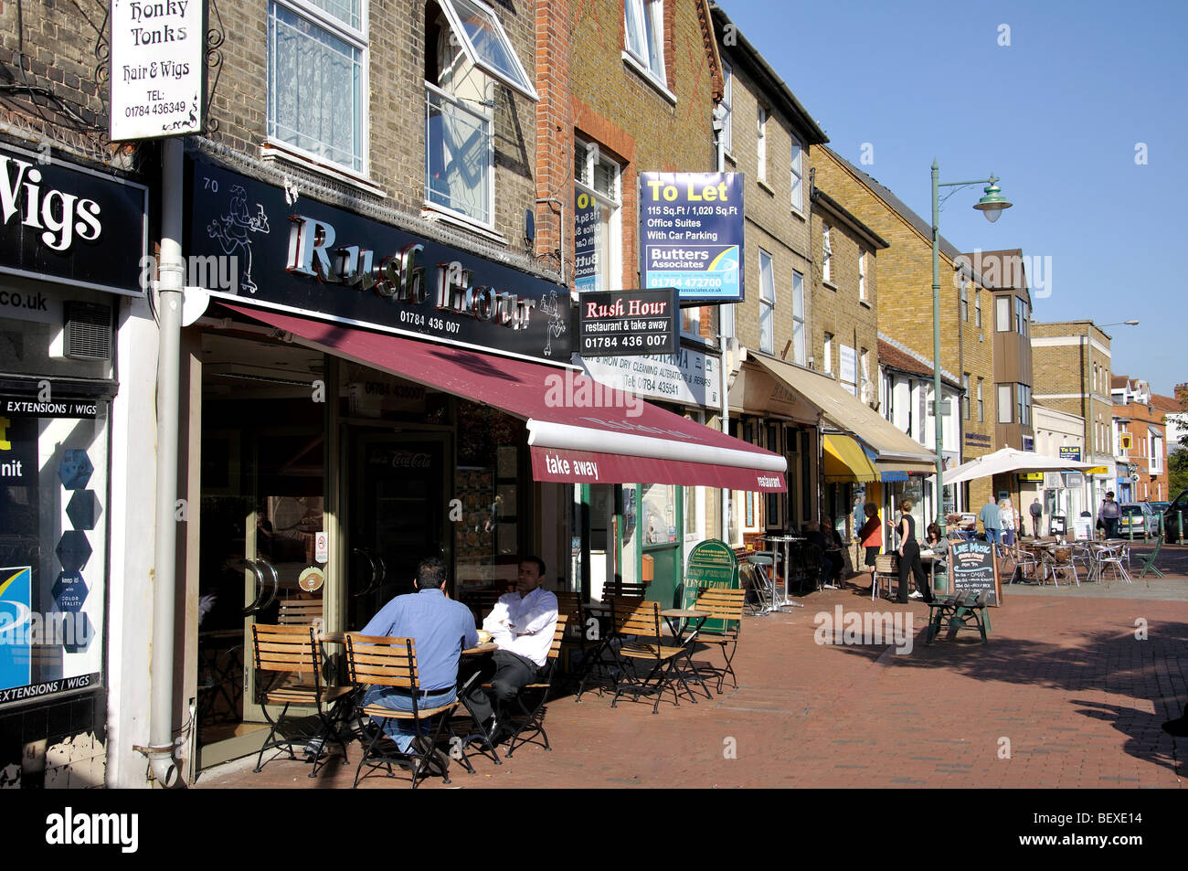Outdoor restaurants and cafes, High Street, Egham, Surrey, England, United Kingdom Stock Photo