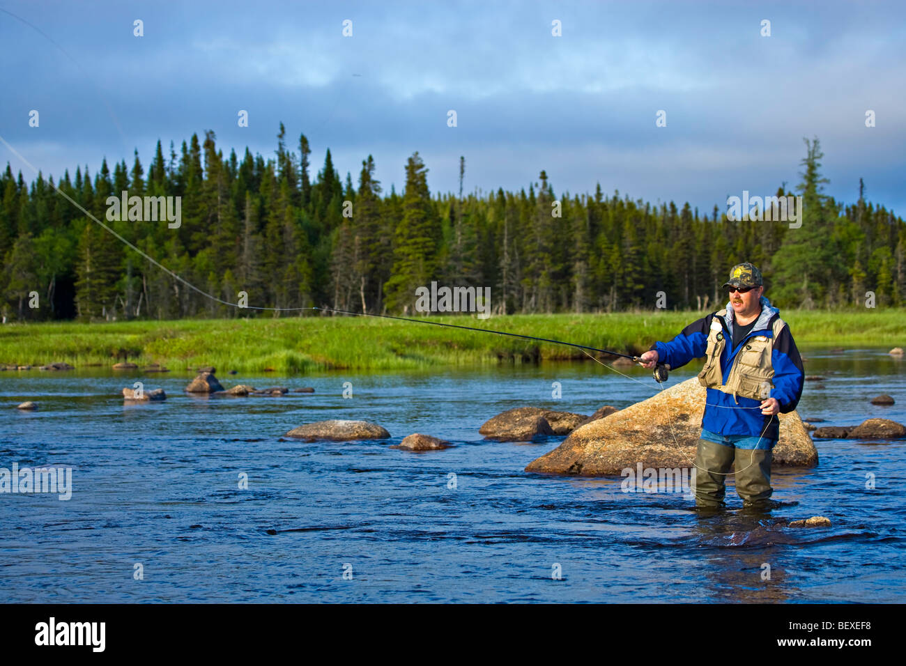 fly fishing in Salmon River near the town of Main Brook,Viking Trail