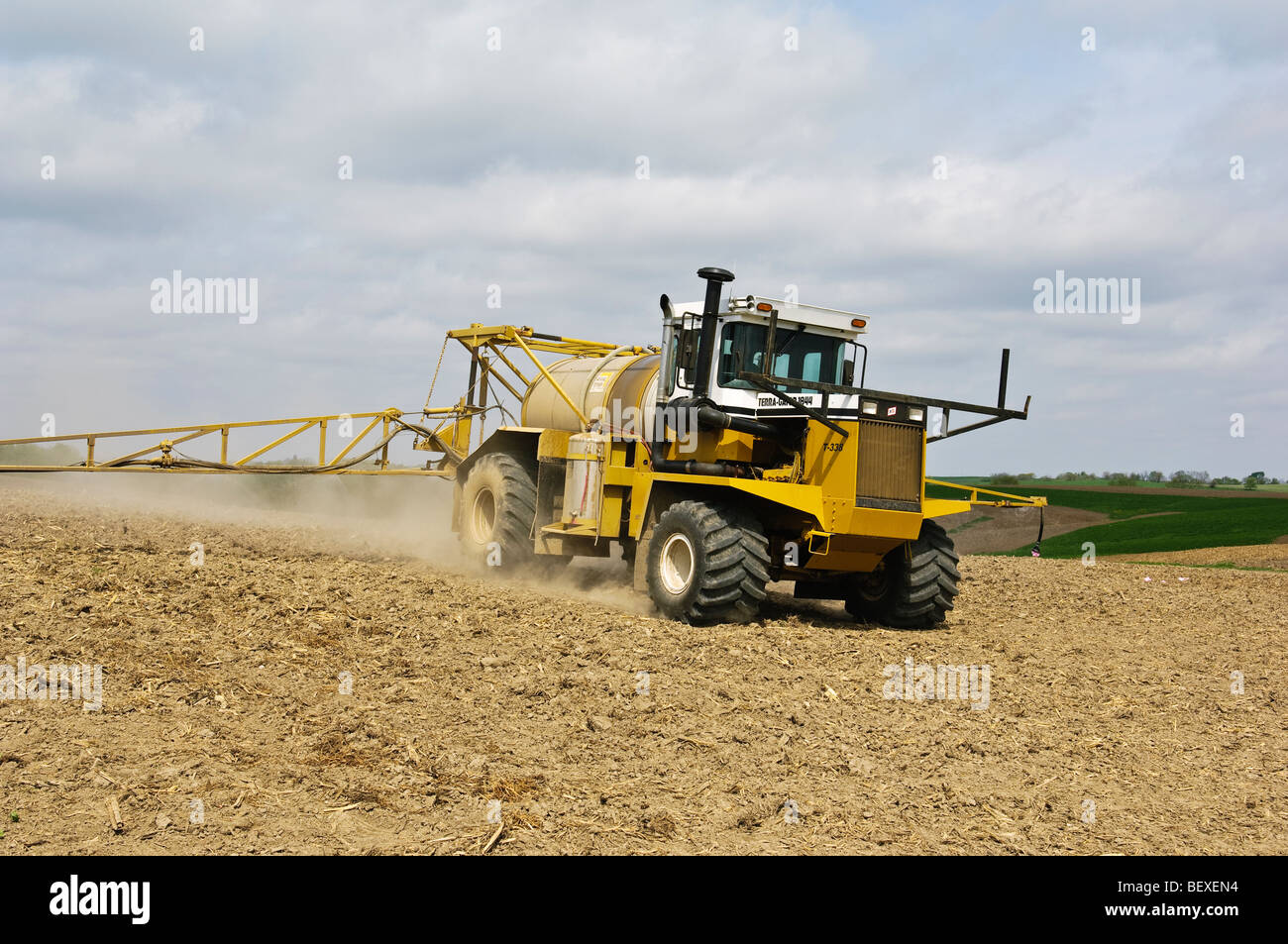 Agriculture Preemergence herbicide being applied to a corn field by