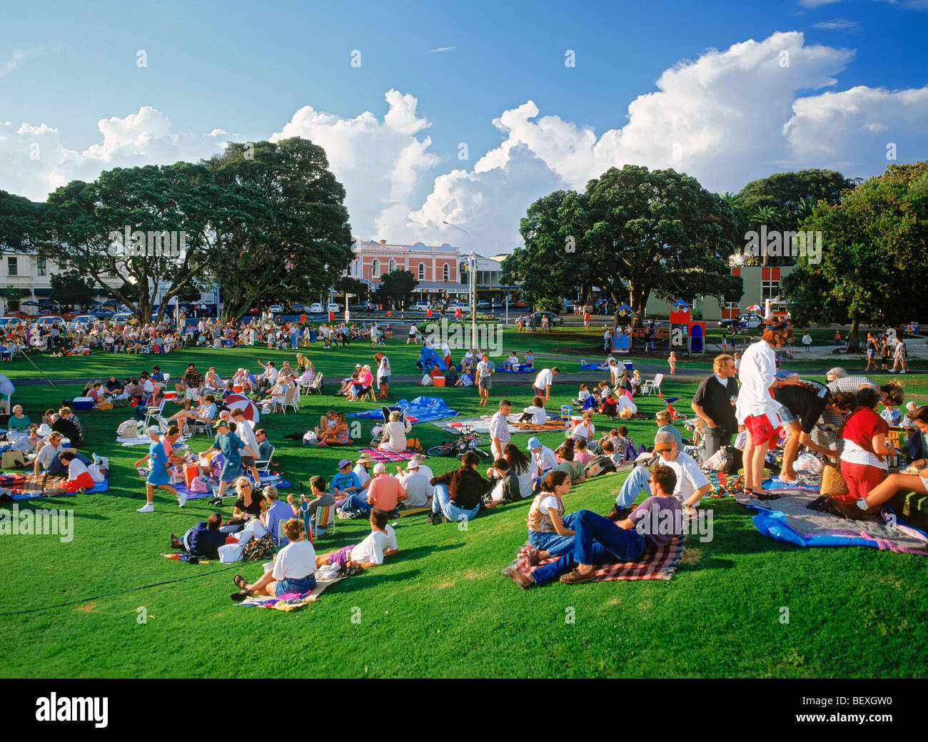 Family fun at outdoor concert on town square in suburb of Auckland called Ponsonby Stock Photo
