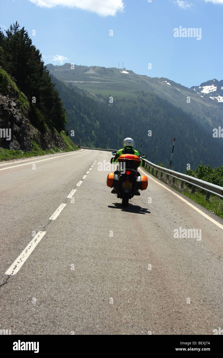 Motorcycle climbing the C-28 mountain road out of Arties in the Catalonia region of the Spanish Pyrenees Stock Photo