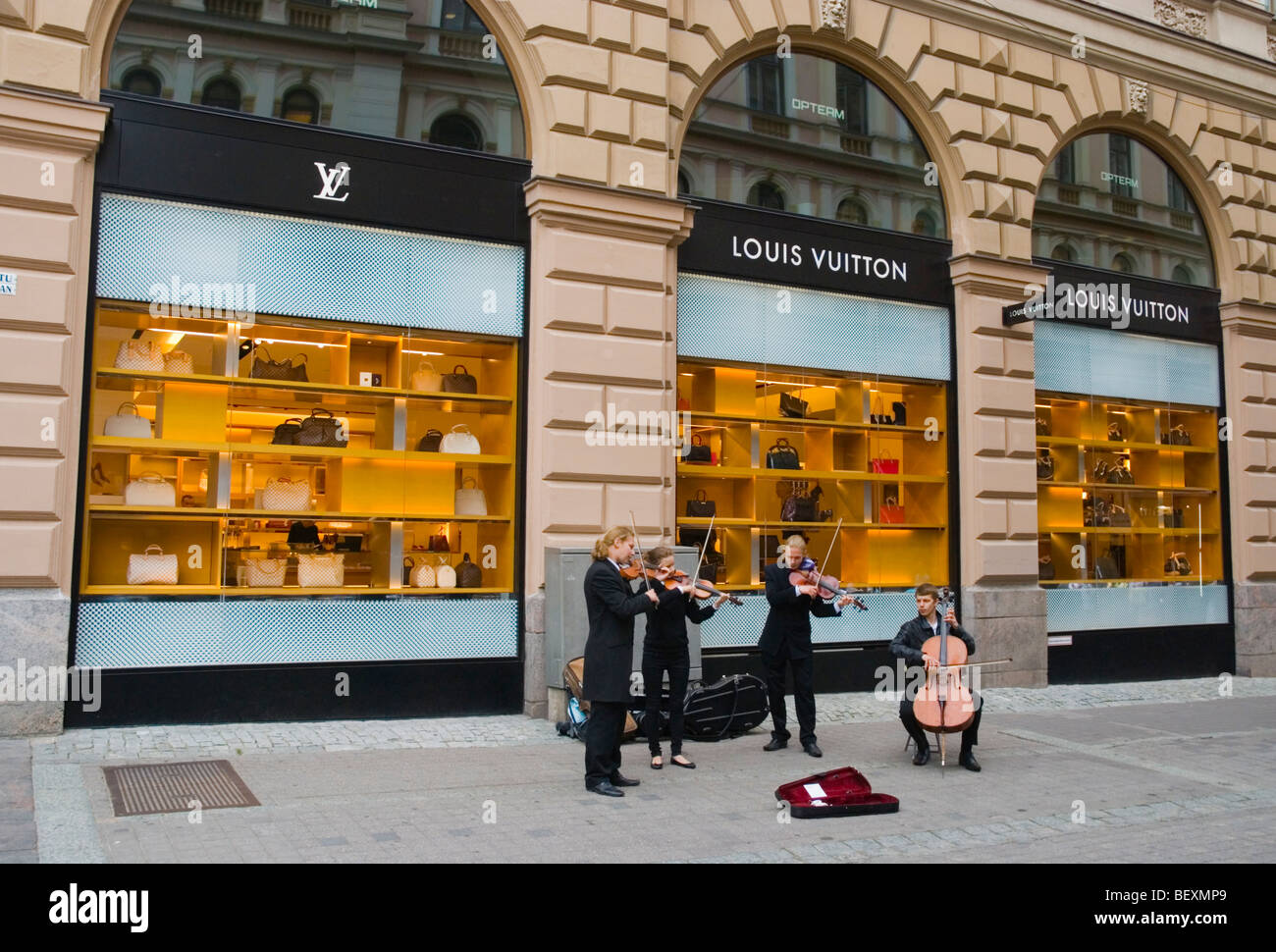 Classical music buskers in front of Louis Vuitton store in central Helsinki Finland Europe Stock Photo