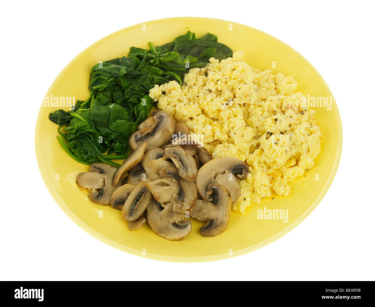 Scrambled Egg With Mushrooms And Spinach Stock Photo Alamy