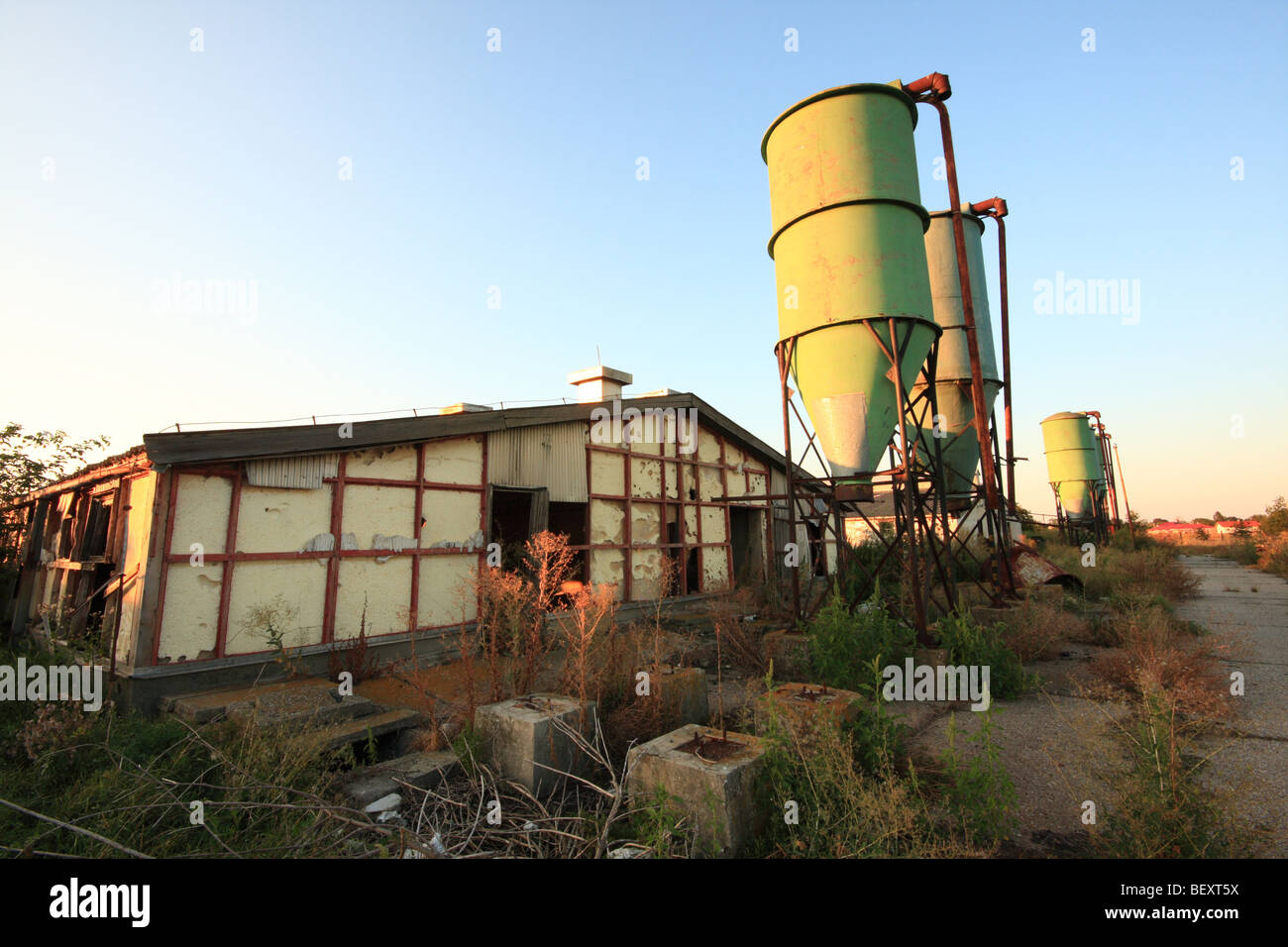 Old stables and feeders of an ex-communist co-op, Slovakia Stock Photo