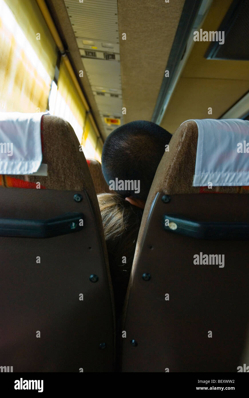 A couple asleep on a long distance bus Stock Photo Alamy