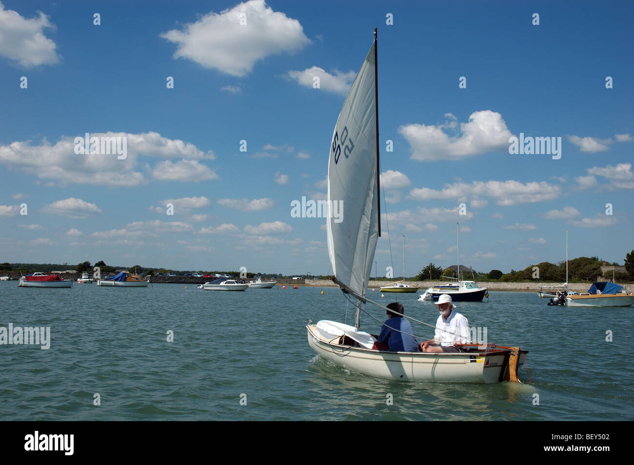 couple sailing at Keyhaven, Hampshire, England, UK Stock Photo