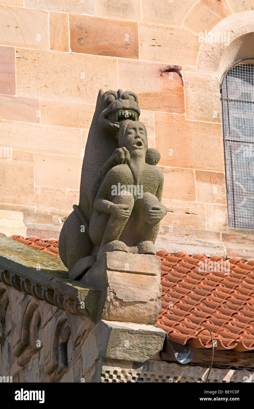 the lion - evil - tempting man - the church of saints Peter and Paul in Rosheim - Alsace - France Stock Photo