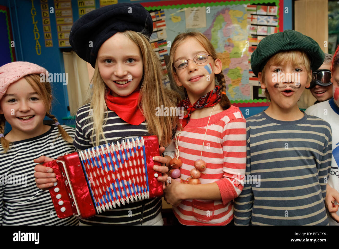 Young pupils dressed in French national costumes for International Day at Ysgol Gymraeg Aberystwyth welsh medium primary school. Stock Photo