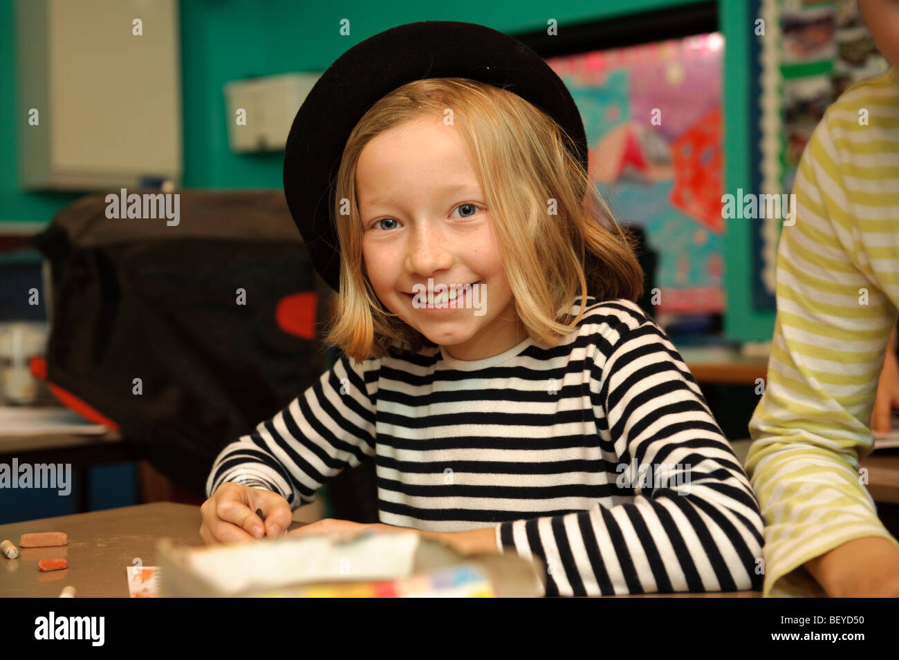 Young pupils dressed in a French national costumes for International Day at a  welsh language medium primary school. Stock Photo