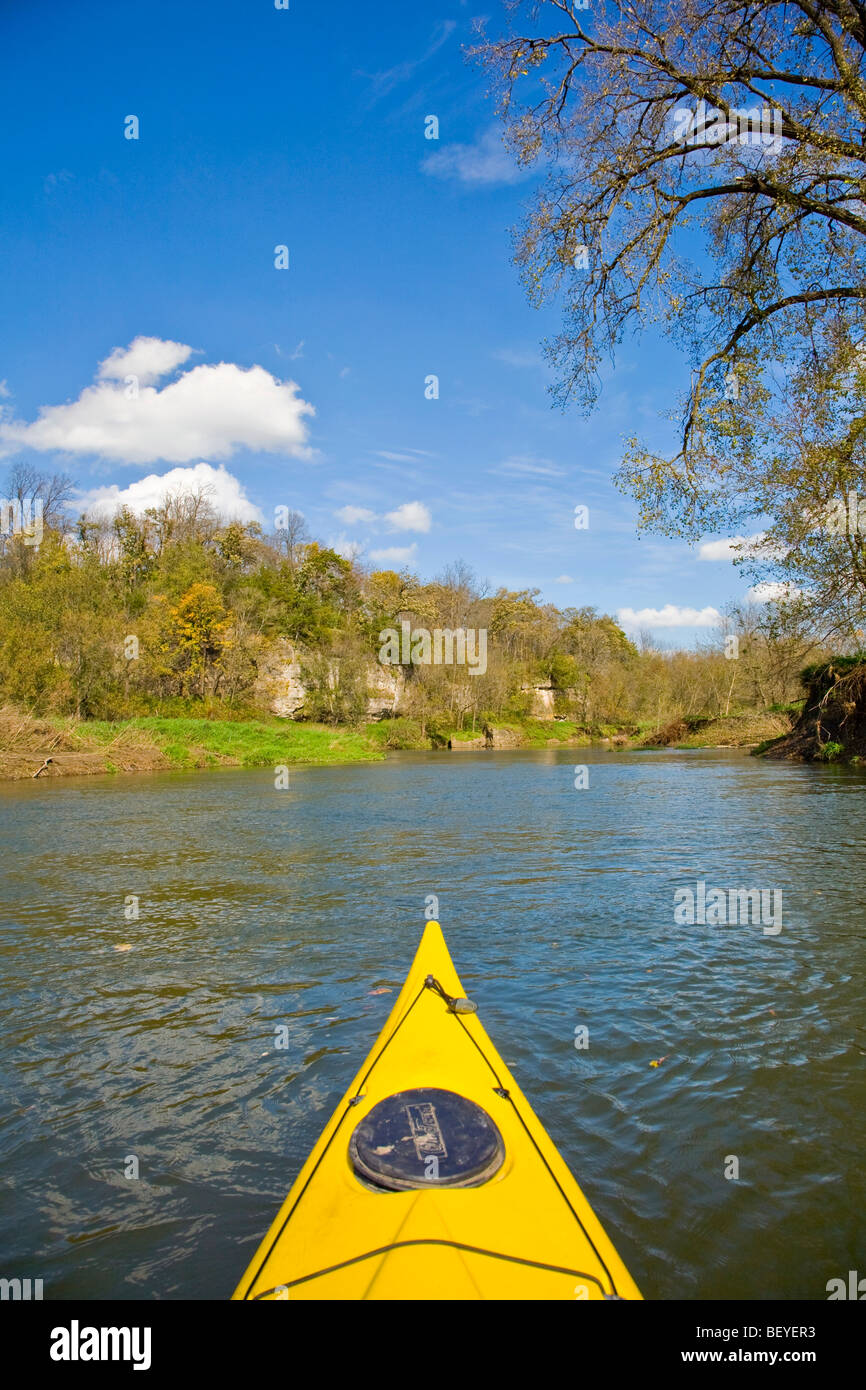 Paddling kayak on the Yellow River on autumn afternoon in Allamakee County north of Monona in Northeast Iowa, USA Stock Photo