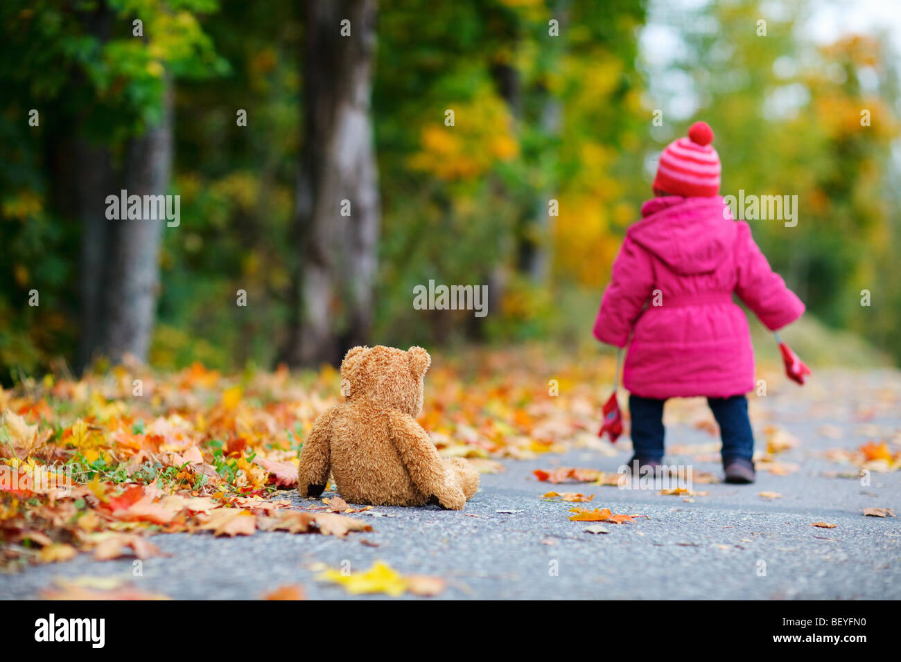 Cute 1 year old baby girl walking outdoors Stock Photo