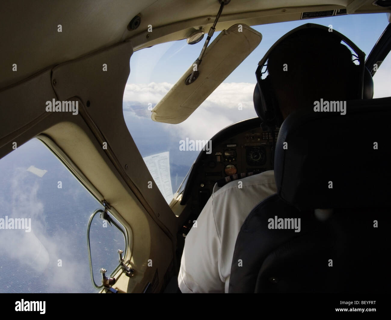 Commercial Aviation, Aircraft in flight. Commuter Flight, Small Plane,Pilot at Controls, Pilots point of view Stock Photo