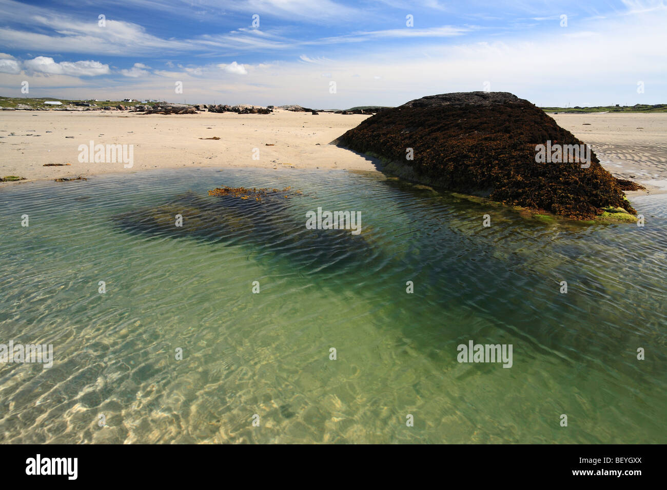 a beach at Omey Island at low tide, Ireland Stock Photo