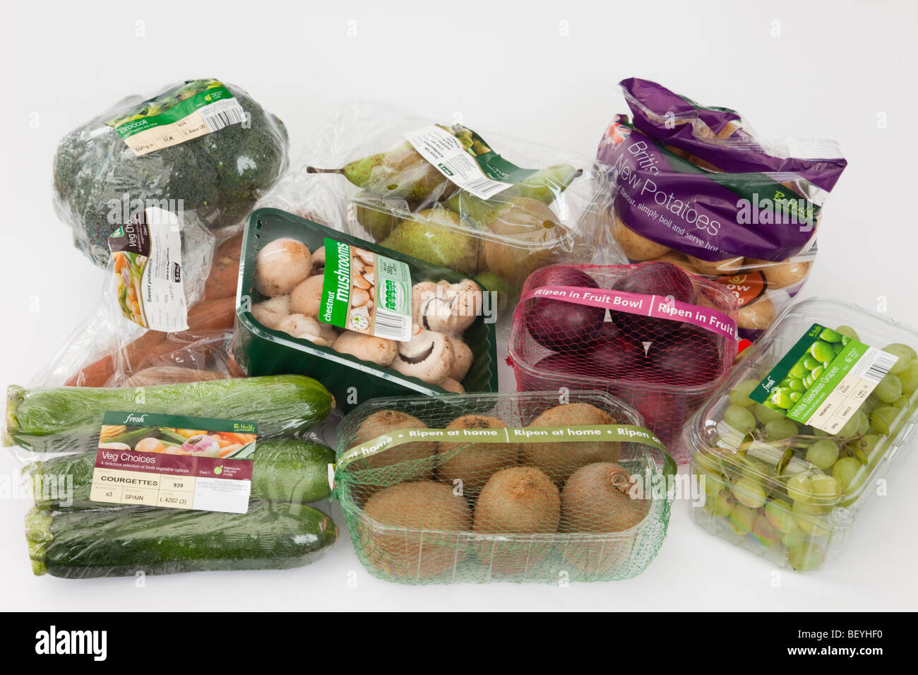 Britain, UK, Europe. Selection of fruit and vegetables packaged in plastic packaging Stock Photo
