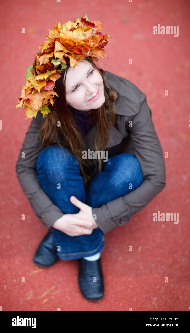 Autumn portrait of beautiful young woman in park Stock Photo - Alamy