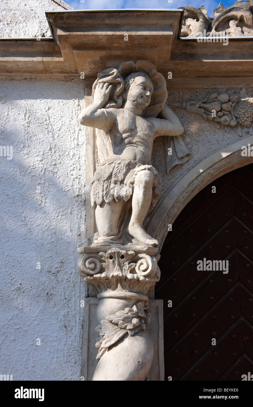 Door statues on The two Moors House. Rustic Baroque architecture - Sopron, Hungary Stock Photo