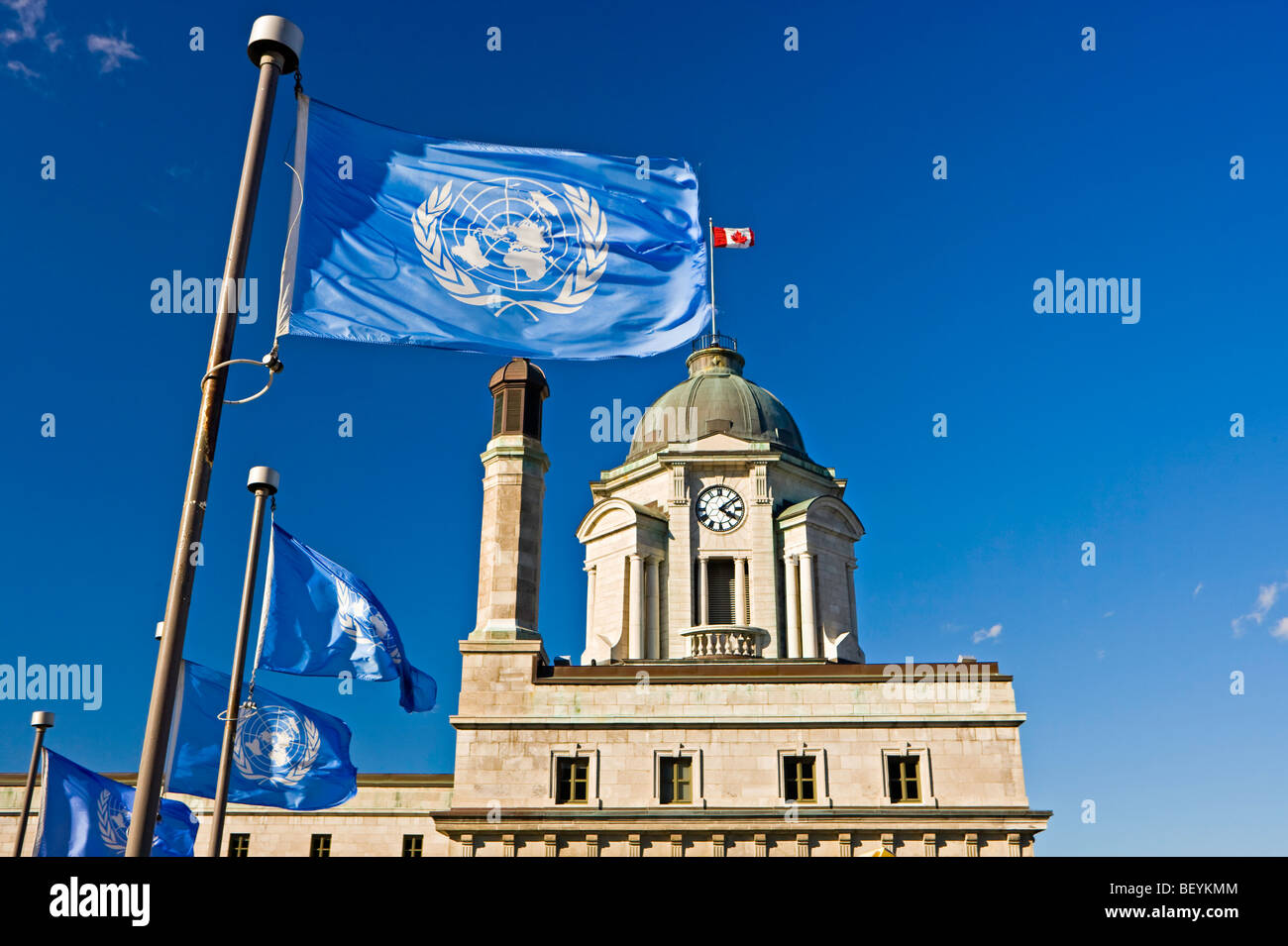 Clock Tower of old Post Office and flags in Old Quebec, Quebec City, Quebec, Canada. UNESCO World Heritage Site. Stock Photo