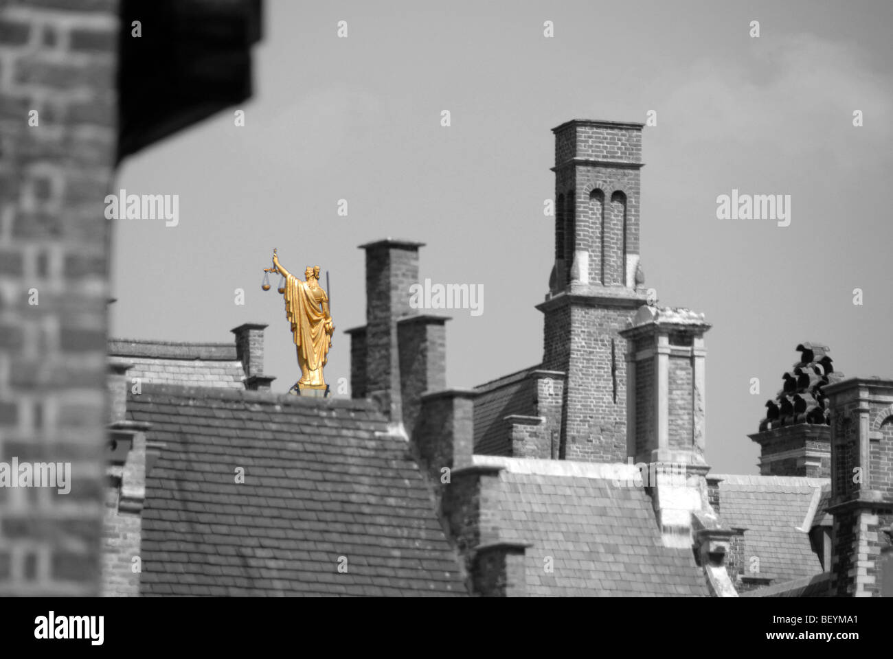 Gilded statue of Justice on the law courts, Bruges, Brugge, Belgium Stock Photo