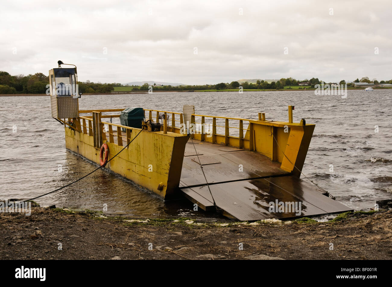 Small car ferry with ramp lowered on a lake Stock Photo Alamy