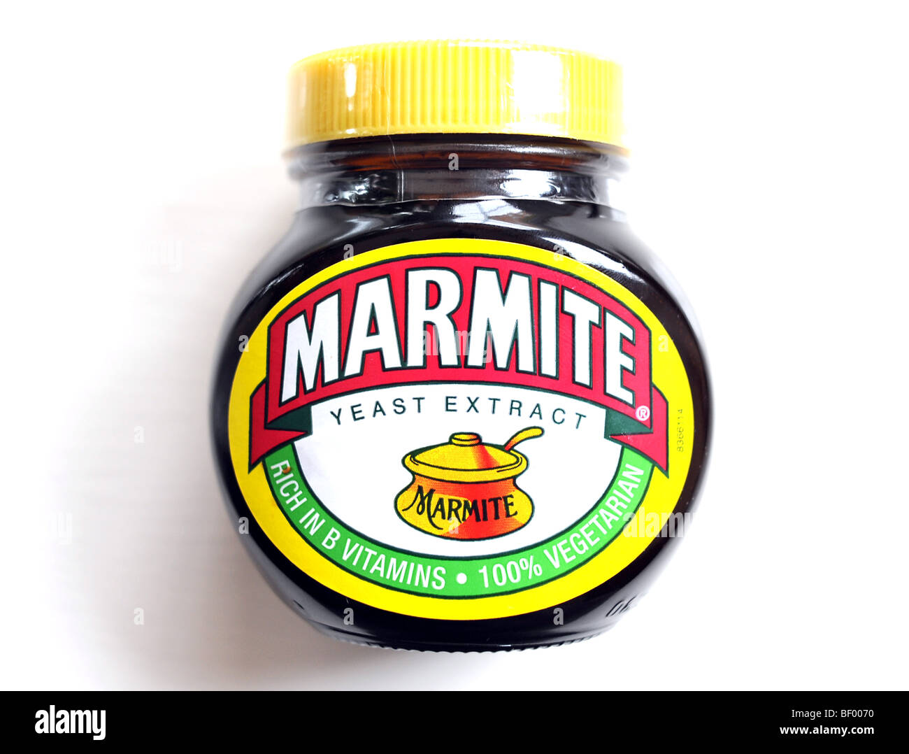 Jar of Marmite yeast extract spread for healthy diet on white background backdrop - Stock Photo