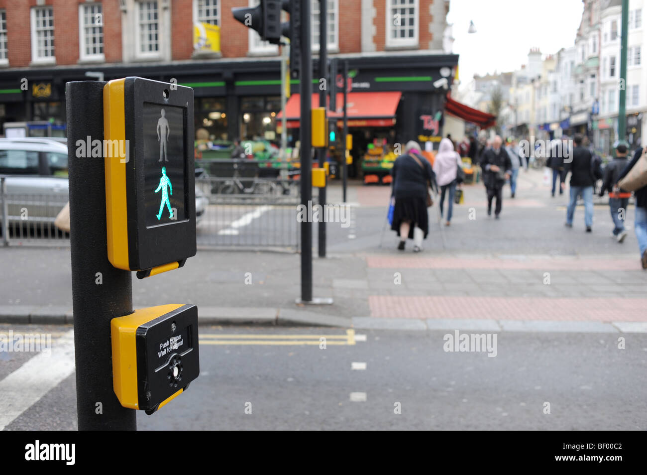 New puffin pedestrian crossings in Brighton city centre The flashing green man gives the all clear to cross Stock Photo