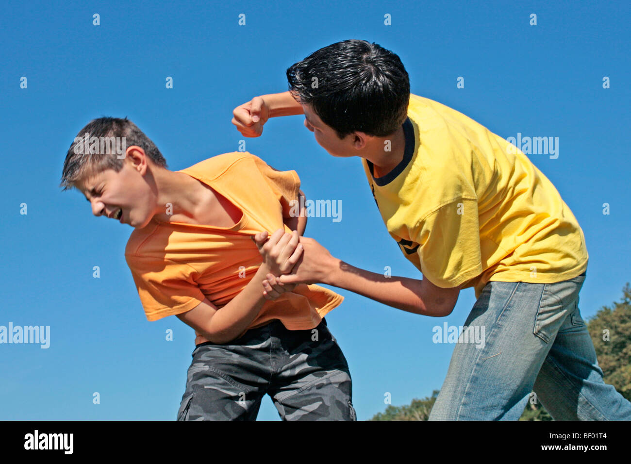 fight fighting boys Stock Photo - Alamy