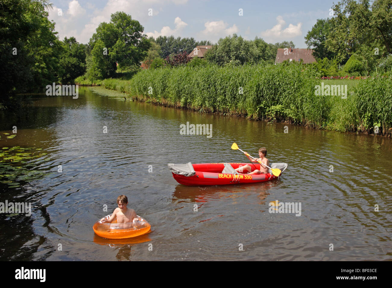 Rubber dinghy kids hires stock photography and images Alamy