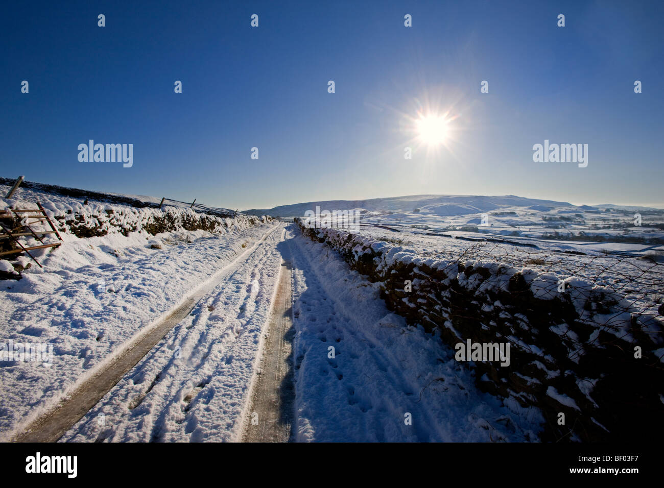 A snowy road in Upper Wharfedale, Yorkshire Dales UK Stock Photo