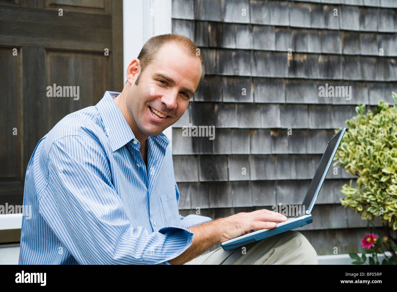 Man working on a laptop Stock Photo