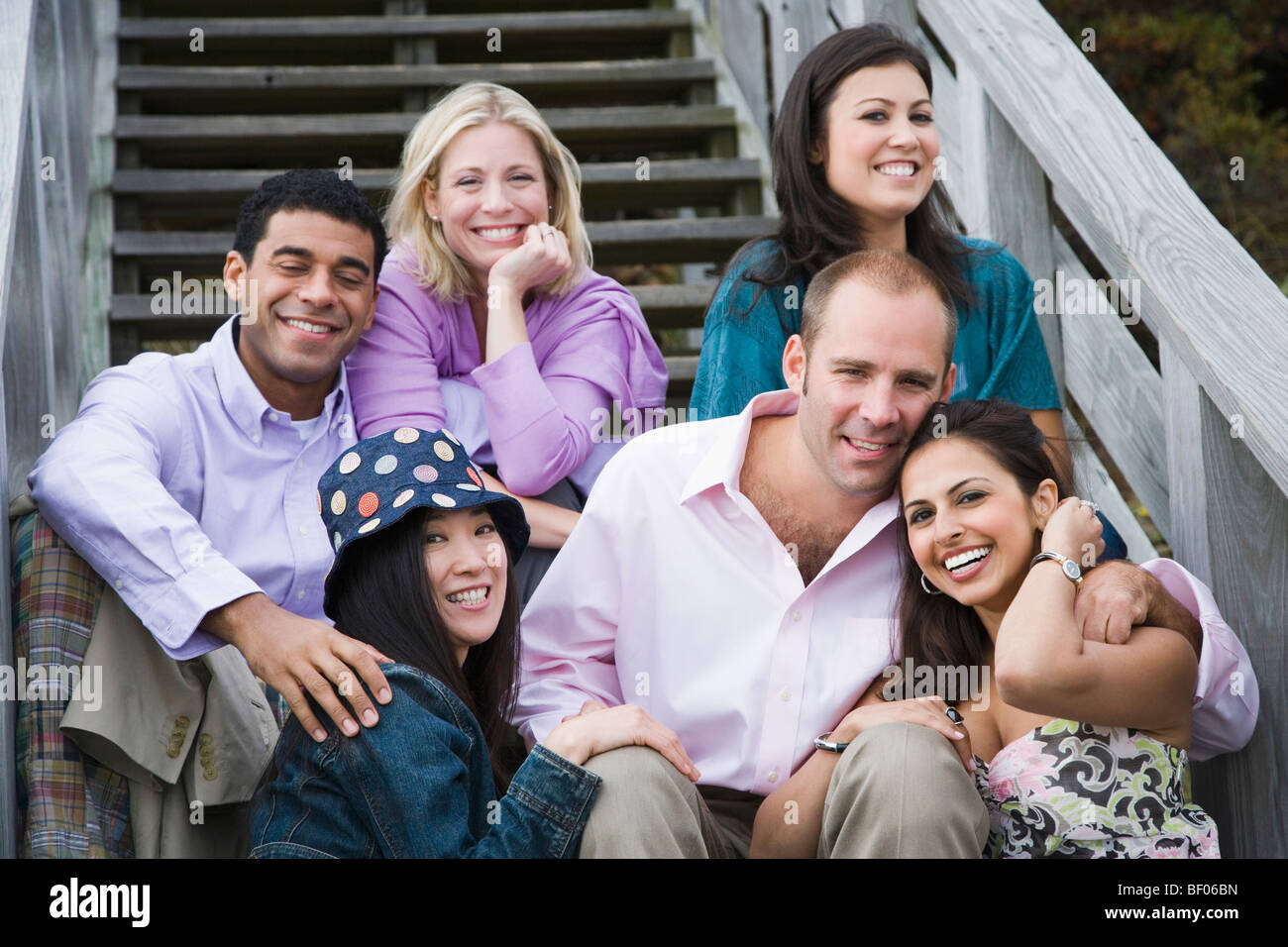 Group mature friends sitting around hi-res stock photography and images ...