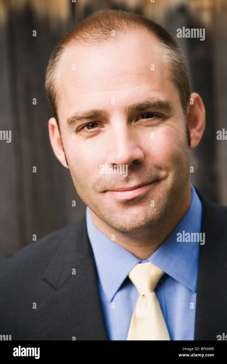 Portrait of a businessman smiling Stock Photo - Alamy