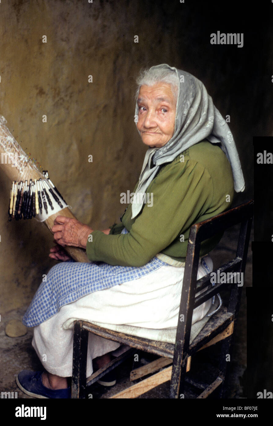 Gozo Malta Woman making lace craft old lady crafts Mediterranean Maltese people women tourist attraction attractions island Stock Photo