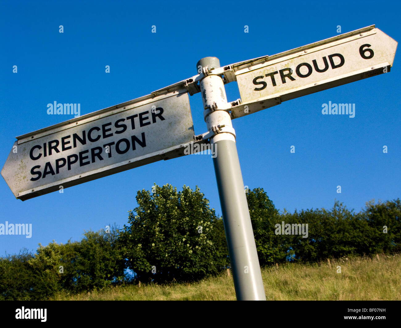Signpost showing directions to Cirencester, Sapperton, Stroud, Gloucestershire, UK Stock Photo