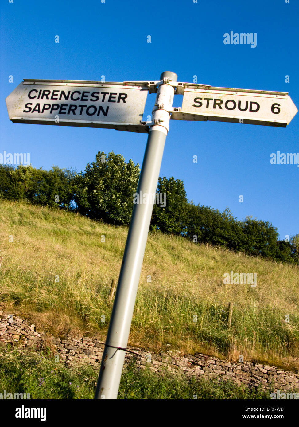 Signpost showing directions to Cirencester, Sapperton, Stroud, Gloucestershire, UK Stock Photo