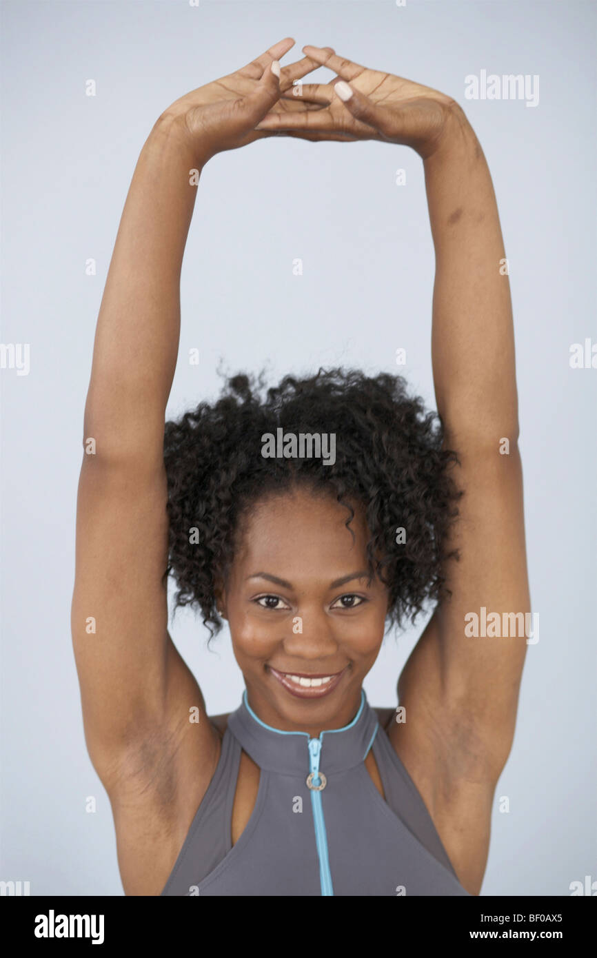 Portrait smiling woman arms hi-res stock photography and images - Alamy