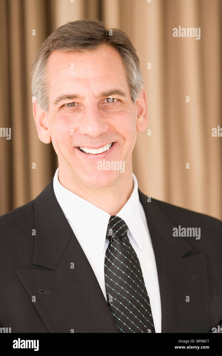 Portrait of a businessman smiling Stock Photo - Alamy