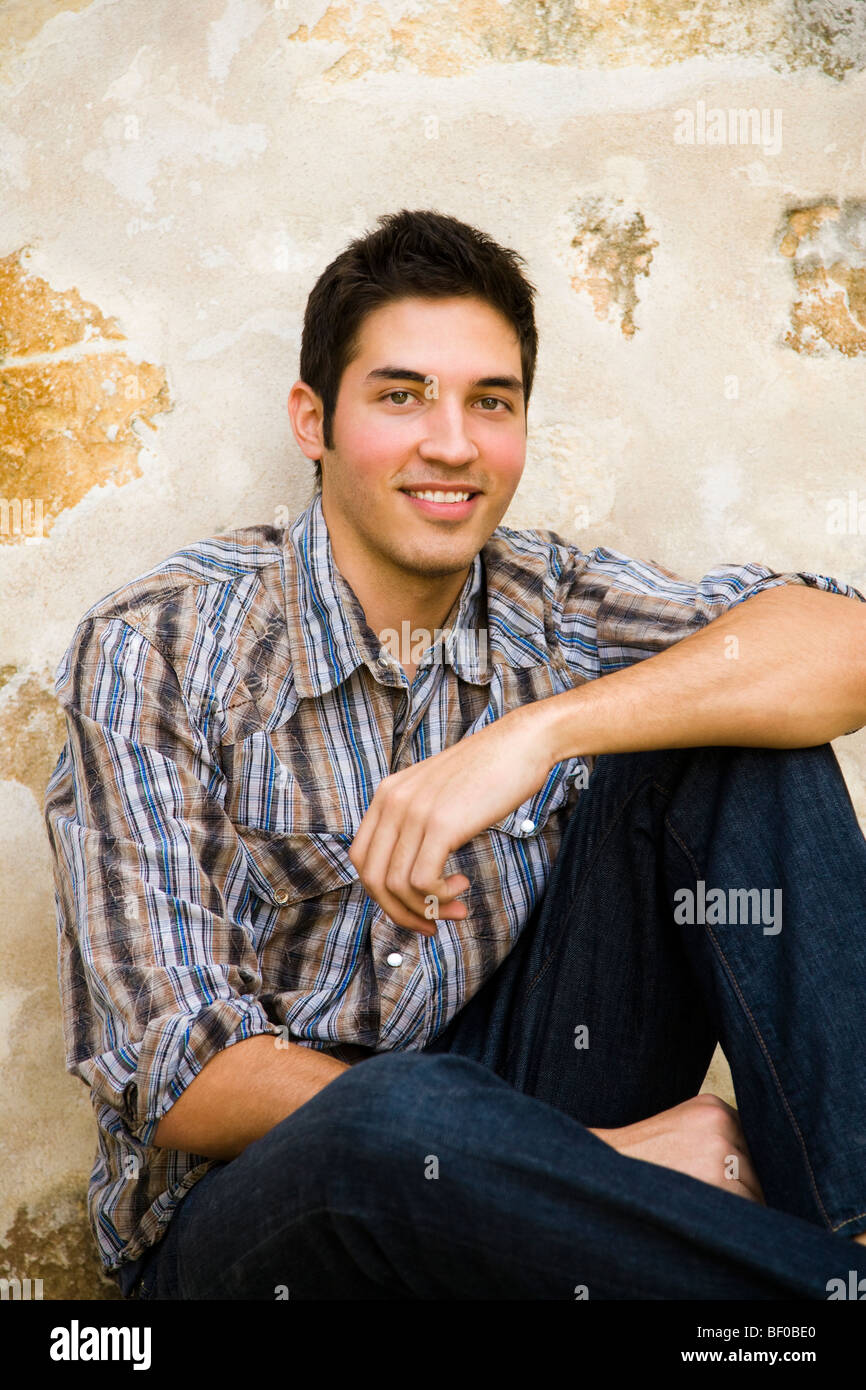 Smiling at man sitting hi-res stock photography and images - Alamy