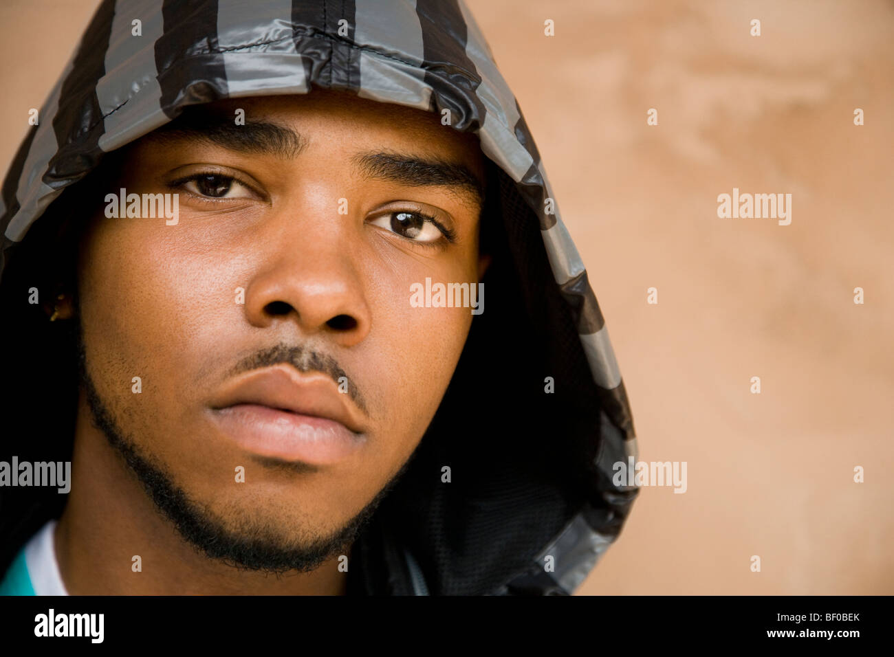 Serious young man one hi-res stock photography and images - Alamy