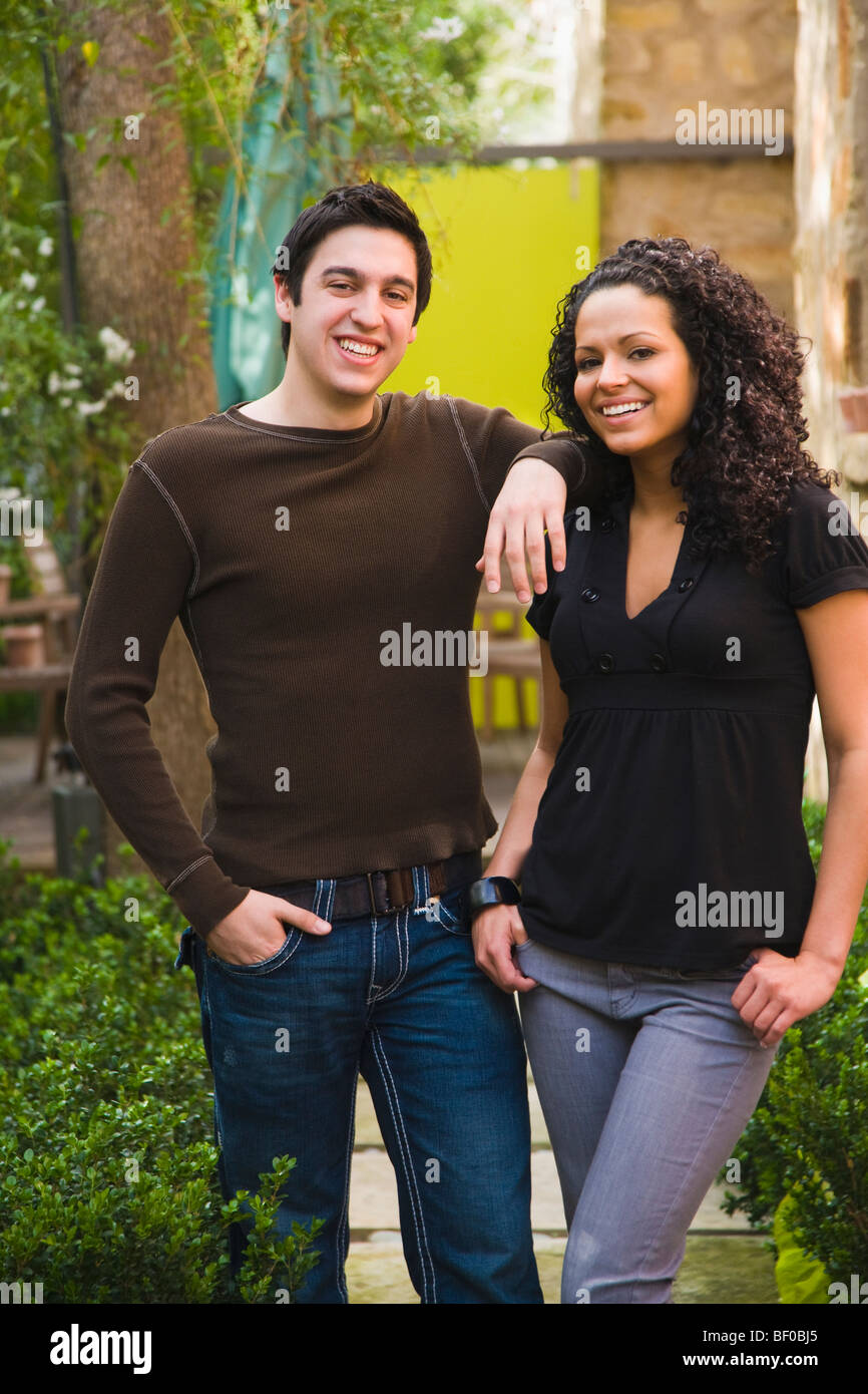 Portrait of a couple smiling in a park Stock Photo - Alamy