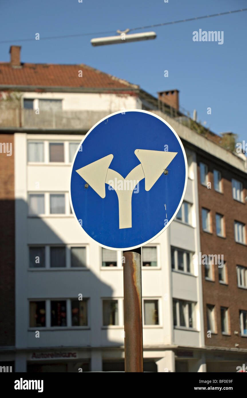 German road sign, left or right turn only. Stock Photo