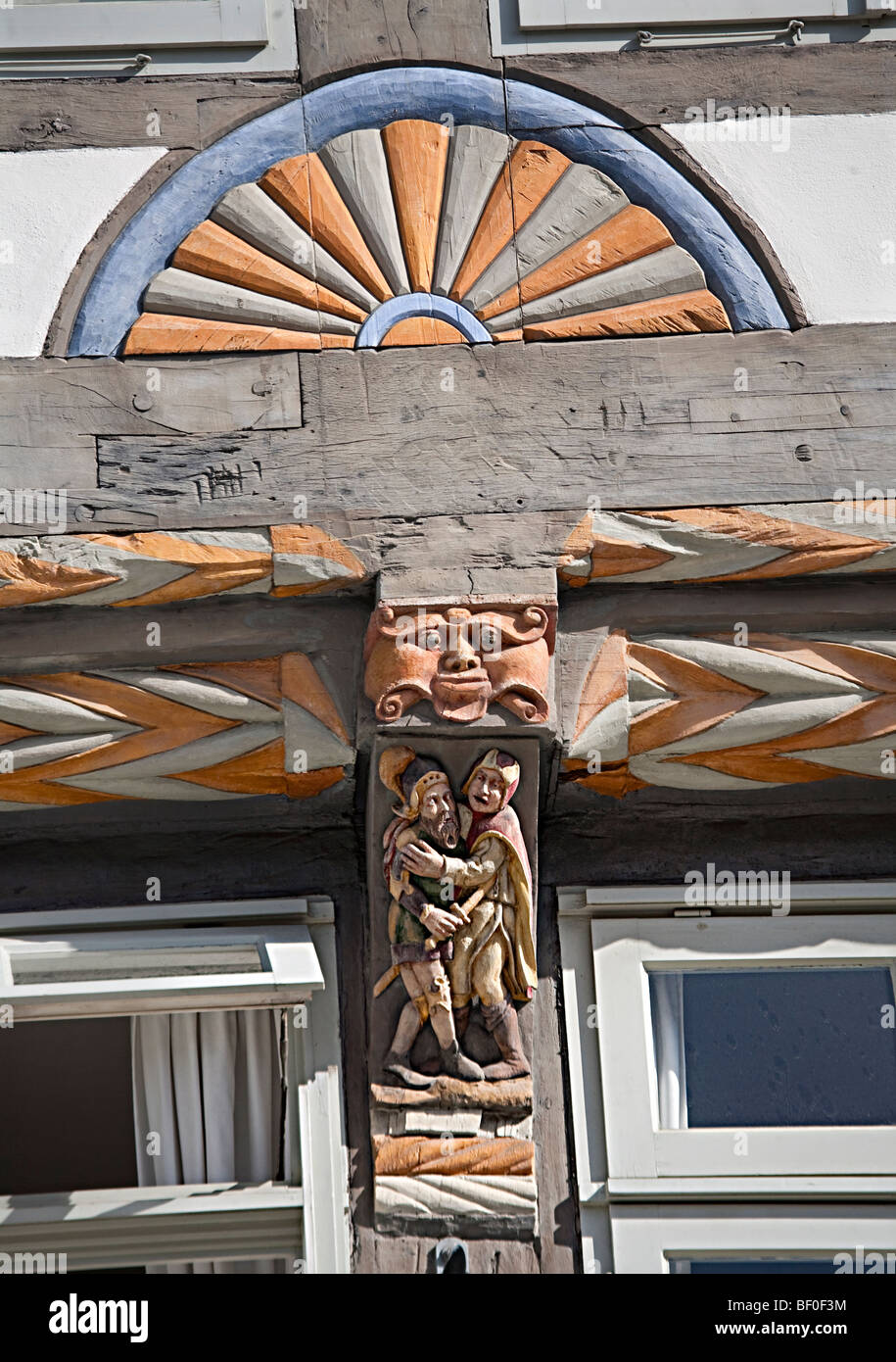 Carved beams on the Stiftsherrenhaus or Capitular's House Hamelin Germany Stock Photo