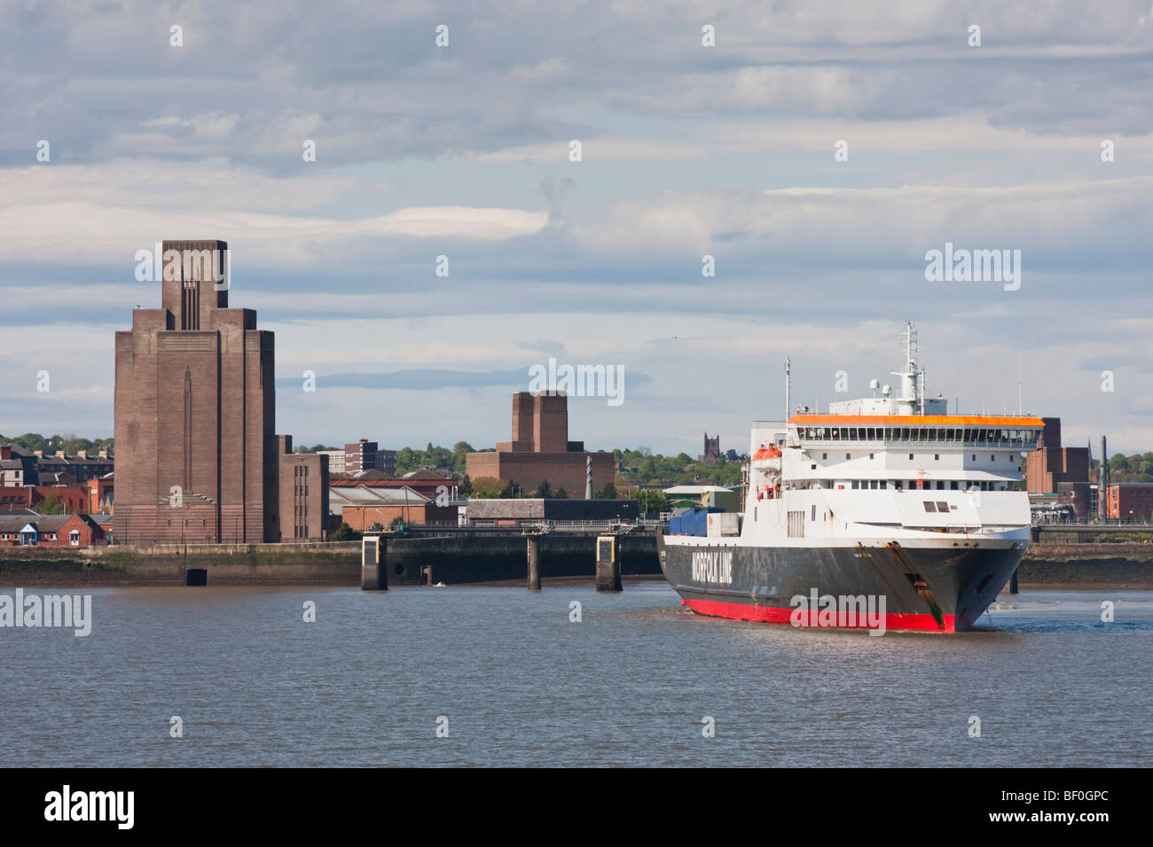 Norfolk Line's Dublin Viking turns in front of the Woodside Ventilation Building, Birkenhead, Port of Liverpool, England. Stock Photo