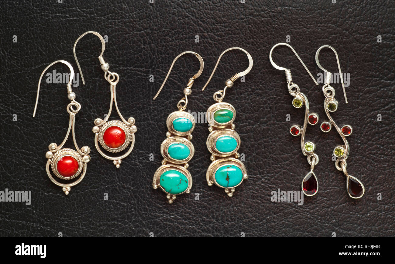 Nepalese crafted earings, semi precious stones, silver supports Stock Photo