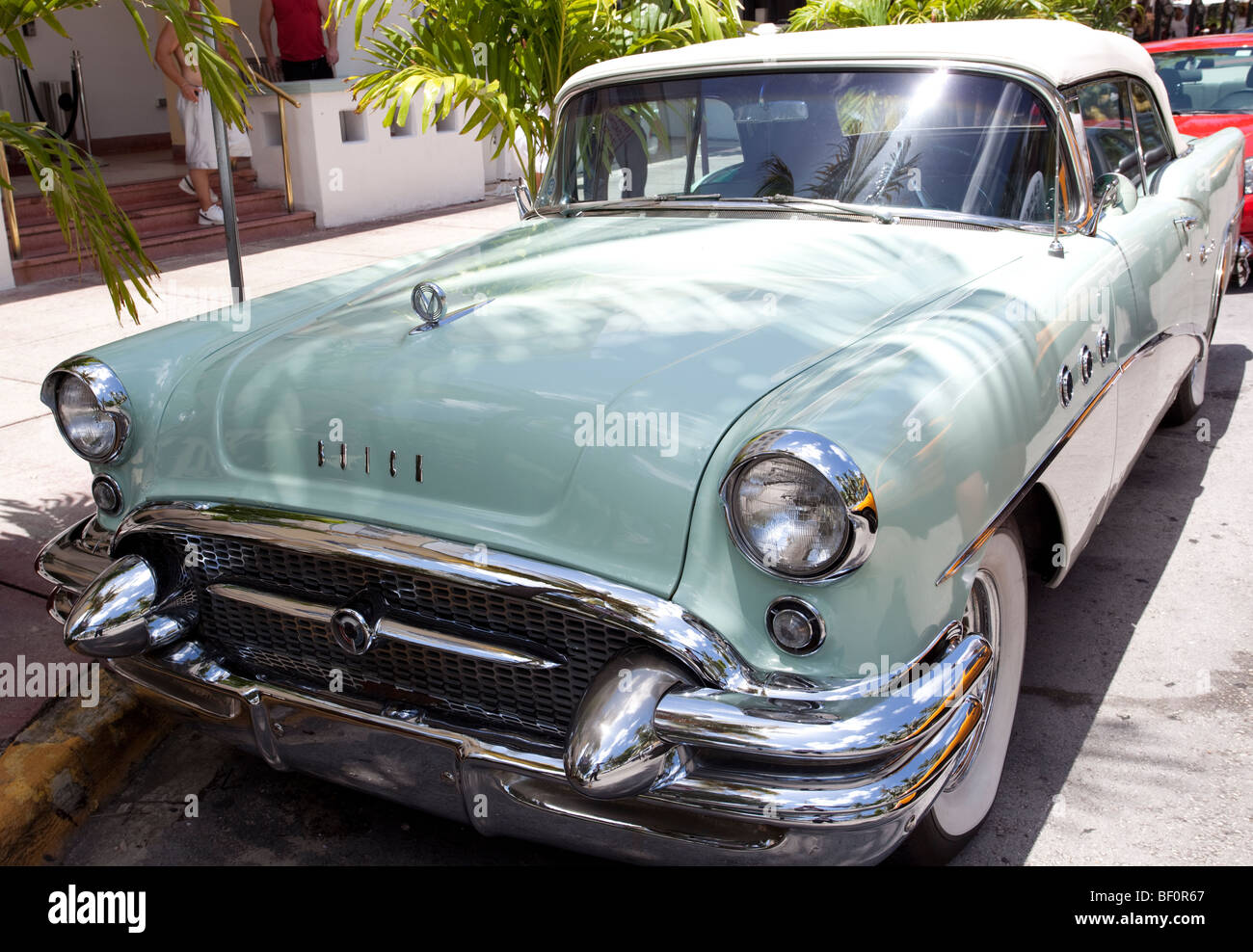 An old car parked on a side of a road, Miami Beach, Florida, USA Stock